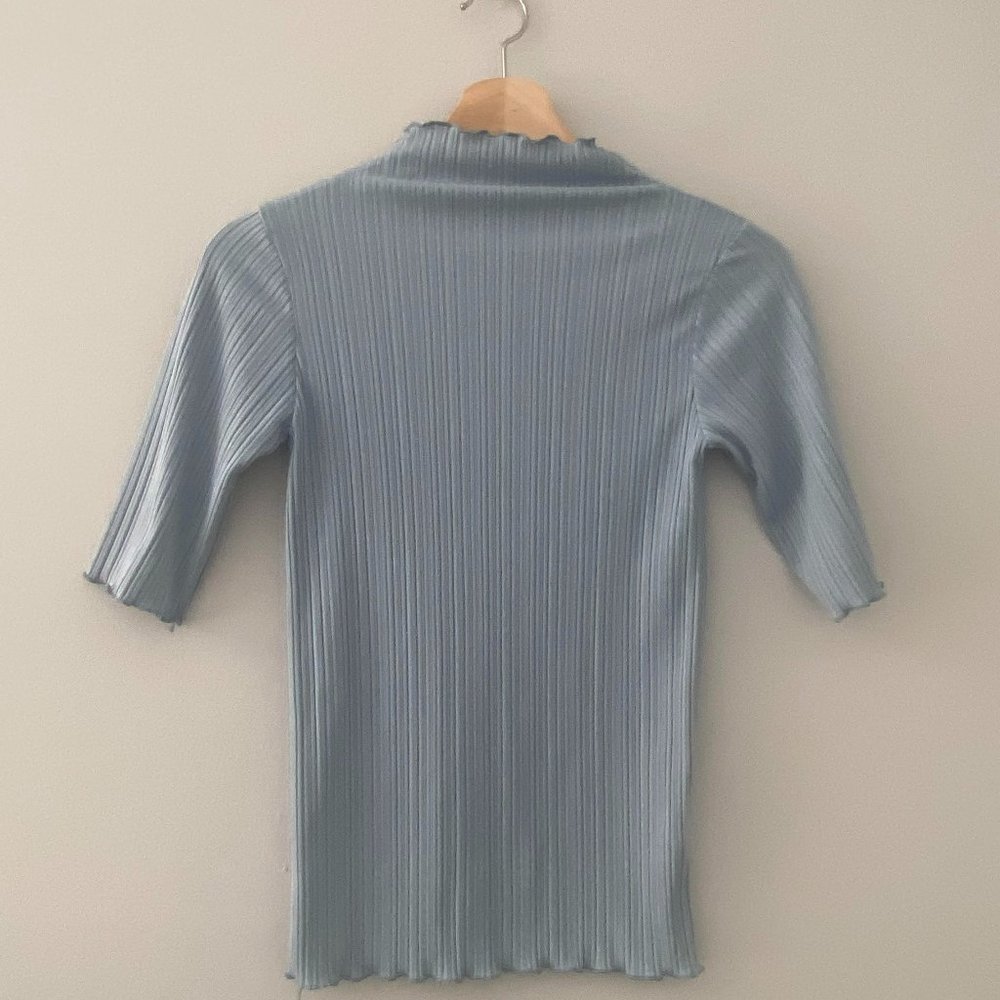 baby blue blouse